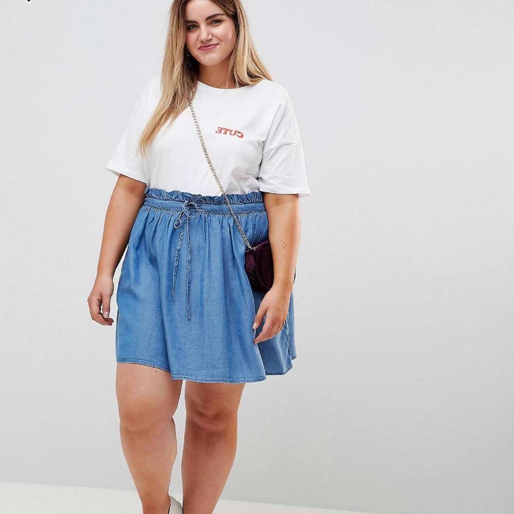 ASOS DESIGN Curve denim paperbag skirt in midwash blue